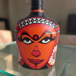 Hand-Painted Tribal Face Art Bottle