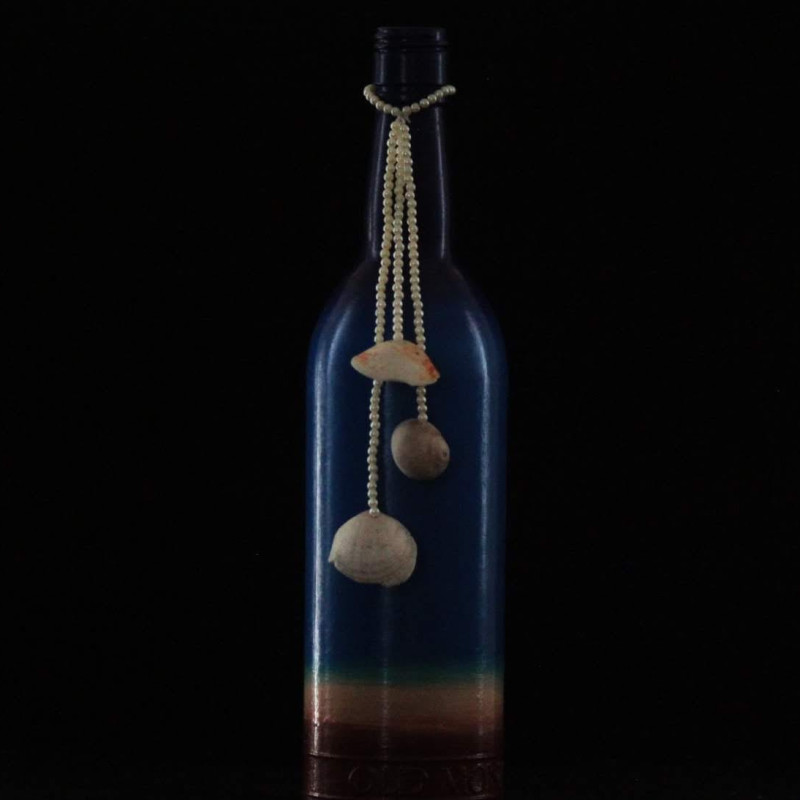 Real shell accents with decorative bead strings